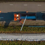 Rail Raise 100 overhead view installing highway guardrail